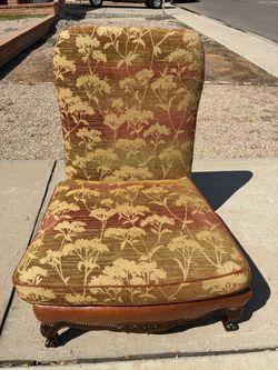 Floral Upholstered Accent Chair with Carved Wood Base