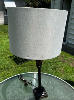 Table lamp with decorative base