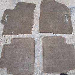 MAZDA6  OR MAZDA3   4-NEW FLOOR MATS BEIGE  FOR $30. 