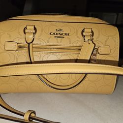 Yellow COACH purse