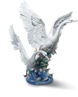 SWANS TAKE FLIGHT