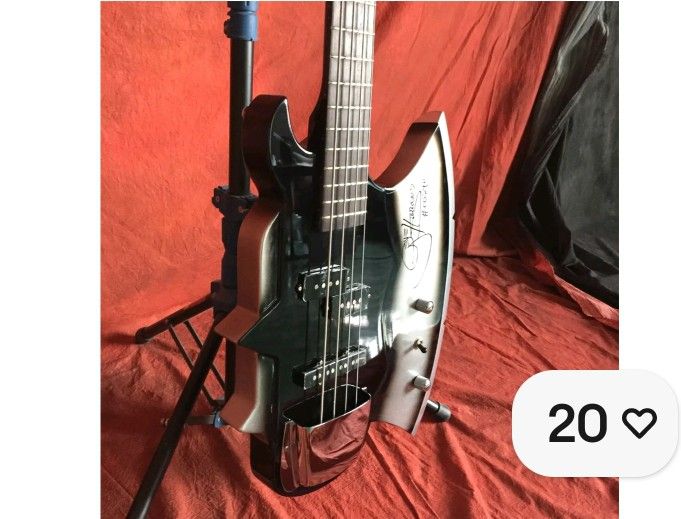 CORT AXE BASS GUITAR. GENE SIMMONS KISS