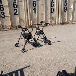 Seated roller walkers with brakes