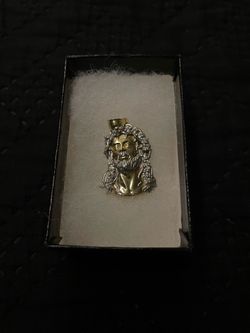 14k gold christ pendant with diamonds incrusted on crown and hair