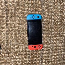 Nintendo Switch And 3 Accessories