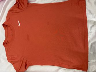 orange nike shirt