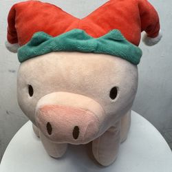 A sitting piglet from the Miniso Mini Family Christmas series