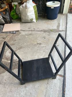 Small metal wood pile holder