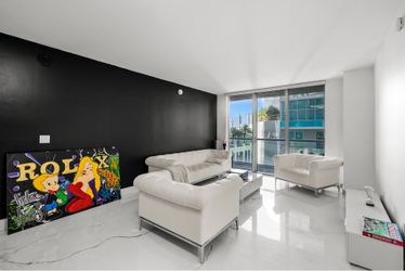 2 love seats, coffee table and tv console