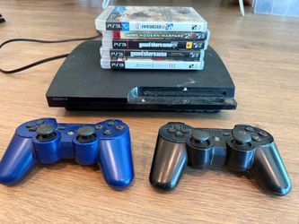PS3 Slim Bundle - 2 Controllers + 5 Games