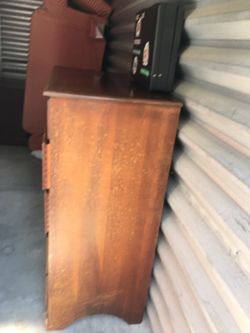 Cherrywood Dresser could use a little refinishing refinishing.