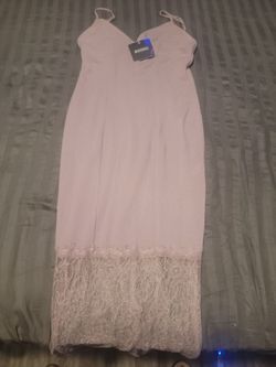 Misguided size 8 midlength lavender spegetti strap with lace section at the bottom of dress