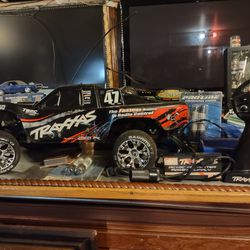 Traxxas Slash 2wd Lots Of Upgrades Has Engine Sound Box Under Body Light's Headlights NEW Wheels And Tire's FAST Truck Extra Shocks $300 OR Trade For 