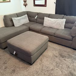Gray Sectional With Matching Ottoman