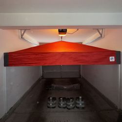 E-Z UP Red 10 X 10 with Roller Bag and 4 25lbs Weight Bags