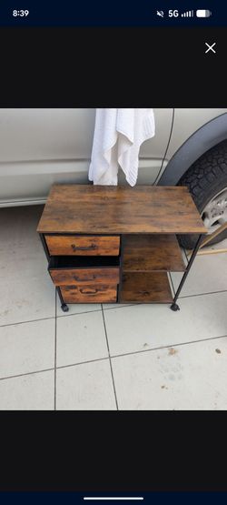 Rolling table desk storage
