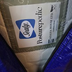Discount deal) Queen Seally Posturpedic mattress/box spring/frame set.