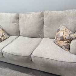 ‏Comfortable Sofa ‏Condition: Gently used, very clean Coler light gray Seater 3 and 2  Large shape No damge