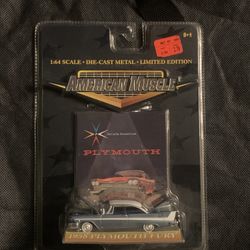 This is an ERTL American Muscle 1:64 scale die-cast model of a 1958 Plymouth Fury