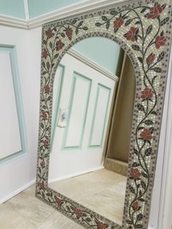 Mosaic rectangular mirror with red rose designs.