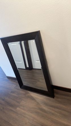 Brown wall mirror