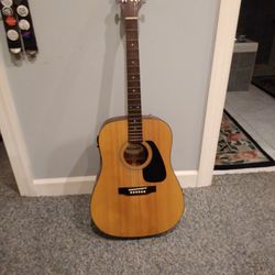 PEAVEY ACOUSTIC GUITAR. WITH ELECTRIC PICK UP     150.00. OBO