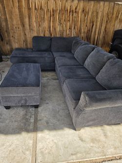 Two-piece sectional with Ottoman