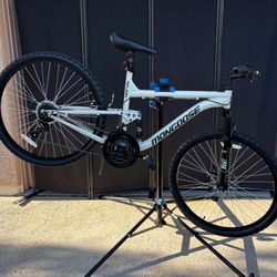 Mongoose Major mountain bike featuring a dual-suspension frame, 26-inch wheels, 18 speeds, mens style frame