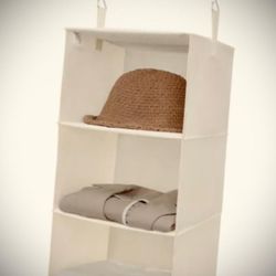 HANGING CLOSET ORGANIZER, WITH 3 PLASTIC SHELVRS. SIZE: 11" X 12.5" HIGHT: 56".
EXCELLENT CONDITION!