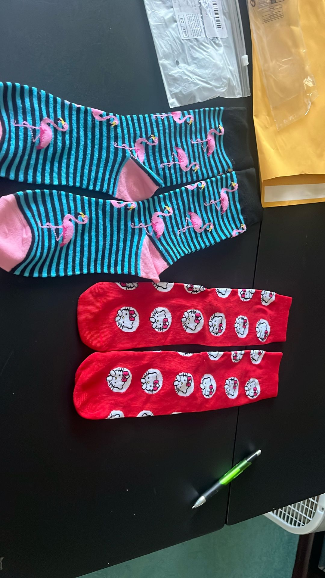 2 new socks hello kitty and flamingo