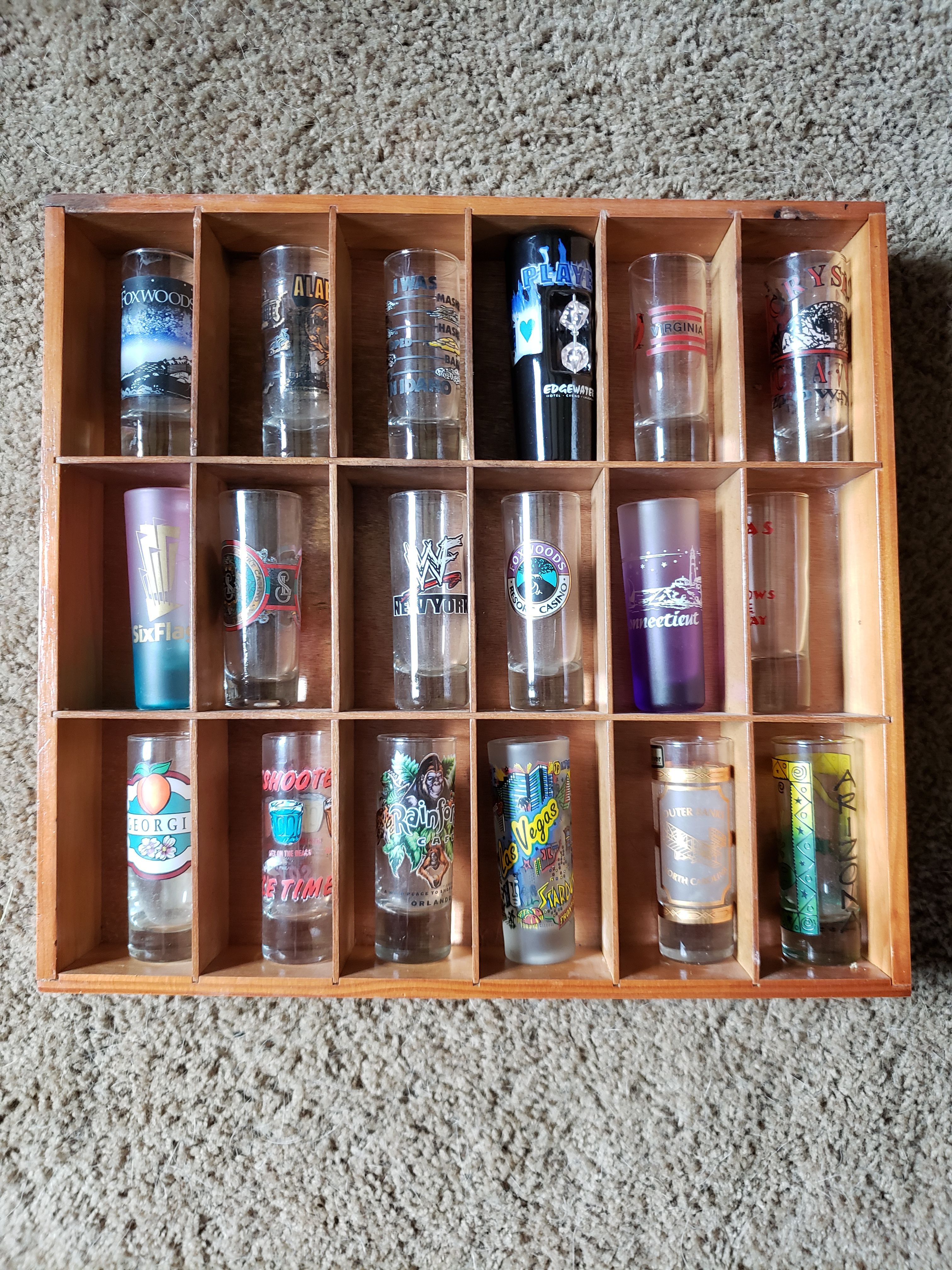 Shot glass collection with shelves