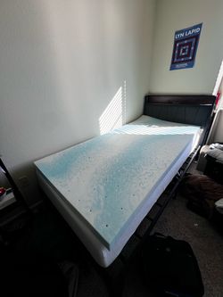 Twin XL memory foam mattress with mattress topper