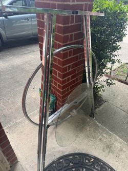 Round glass top garment rack