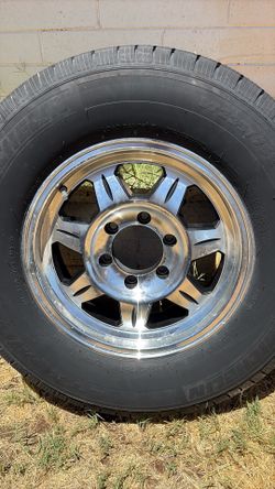 LT225/75R16 tire and rim