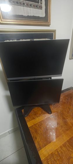 Two HP 24" monitors with stacked stand