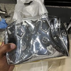 Louis Vuitton Speedy Bandoulière 20 Monogram bag in silver