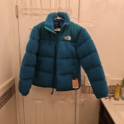 The North Face Puffer Jacket.