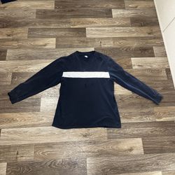 vintage Nike long-sleeve, colorblock striped shirt in a dark blue/black and gray colorway with an embroidered logo. 