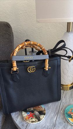 Black Purse with wooden handles and long strap, velvet inside
