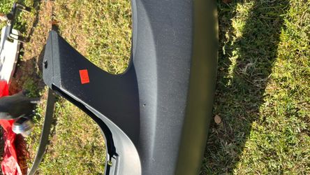 Bumper Primed front bumper cover is made of plastic and has a matte black finish. This replacement part . Thats a bumper for a 2006ish Toyota Corolla 