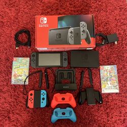 Nintendo Switch  Console - 32GB  Extra Blue And Red Controllers And Three Games And Wall Mounted 