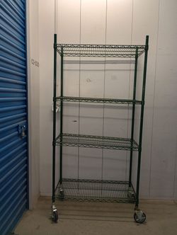 Solid metal wire rack with adjustable shelves