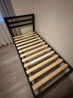 twin bed with mattress ( like new )