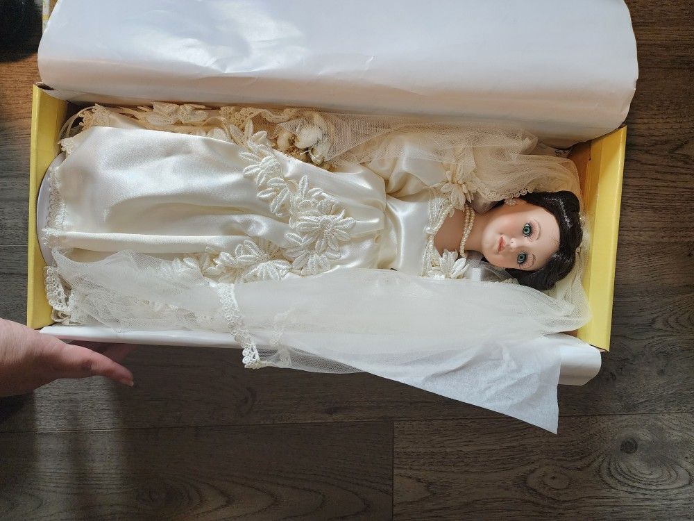 Porcelain bride collector's doll never taken out a box