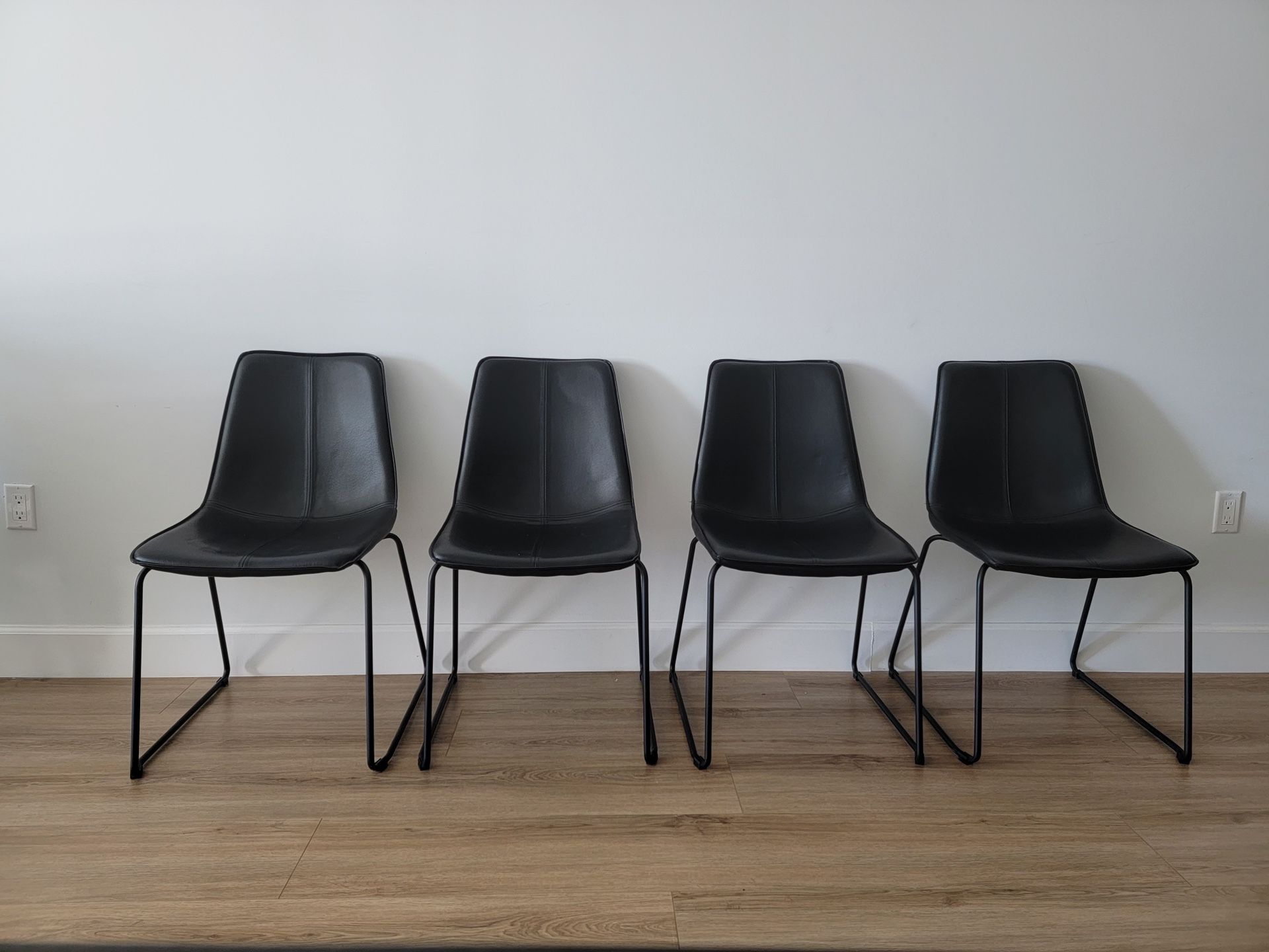 Four Oken Black Dining Chairs