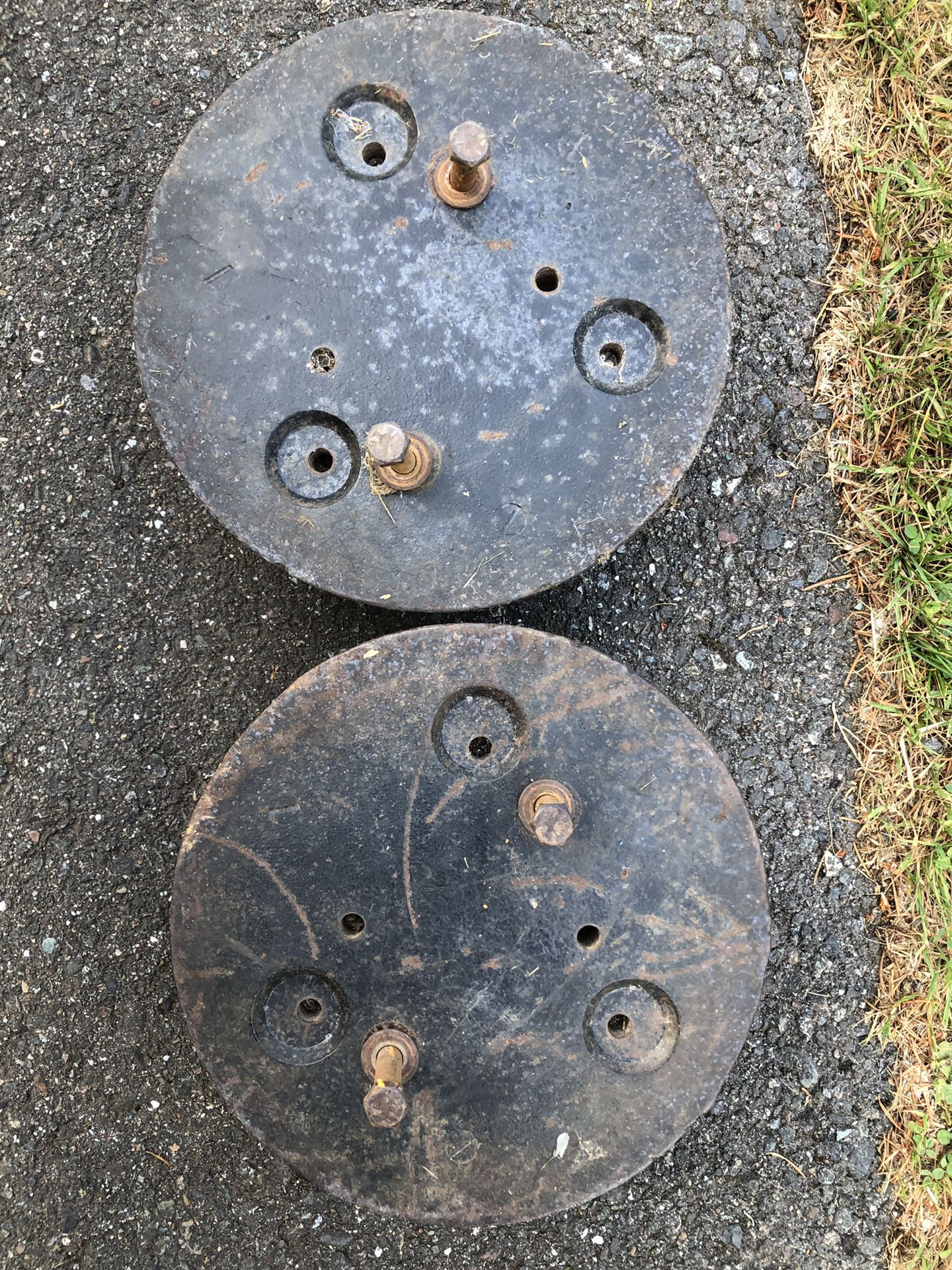 Riding lawn mower wheel weights.
