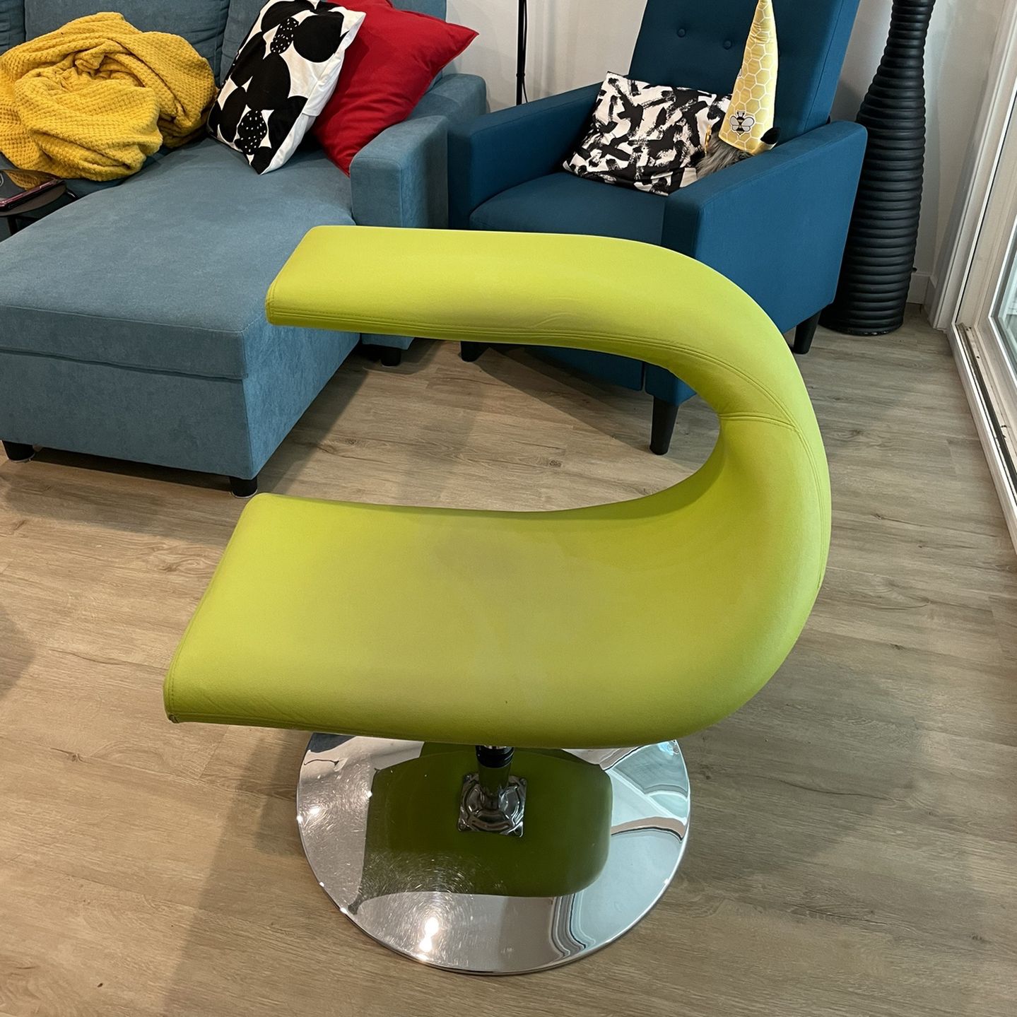 green asymmetrical accent chair