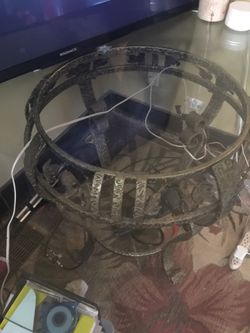 Glass metal based Rid Iron it’s a beautiful glass table with a beautiful chairs match the chairs of recently I’ve been recovered I am asking 150 for