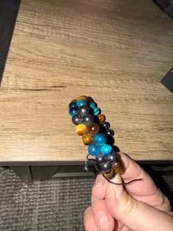 Yellow, blue tiger eye and hematite brackets