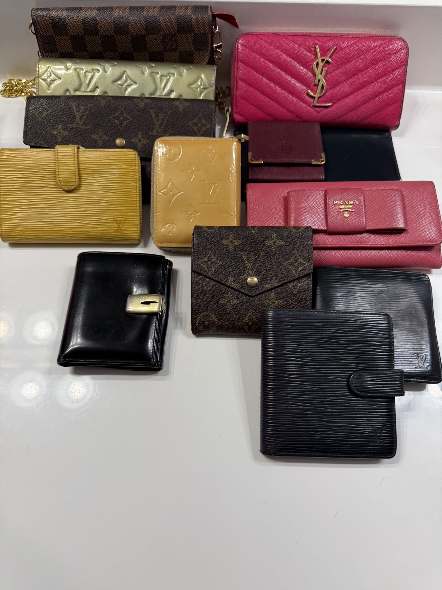 Louis vuitton, gucci, cartier, prada, YSL